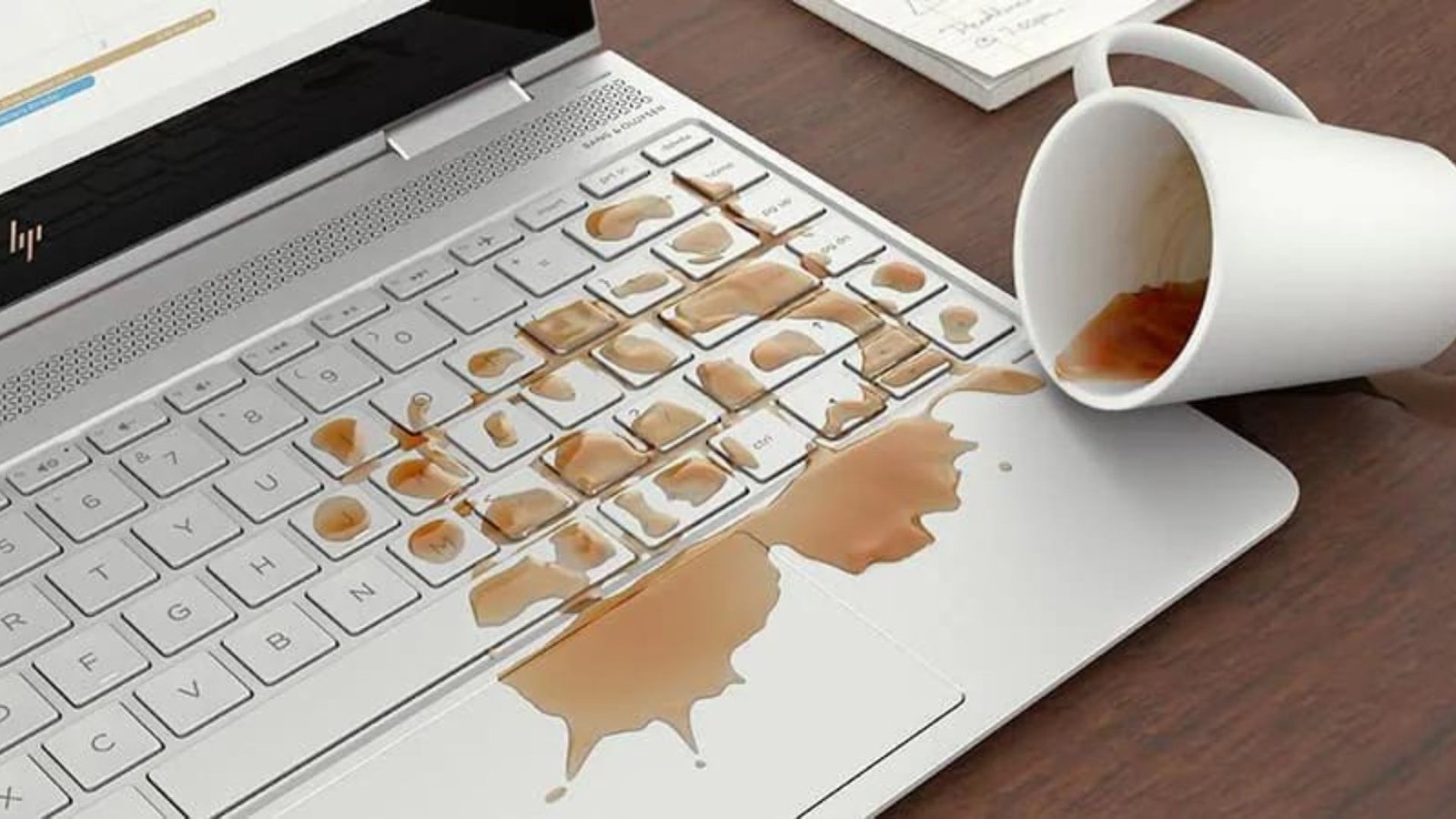 coffee spilled on the laptop showing practices for personal computer maintenance